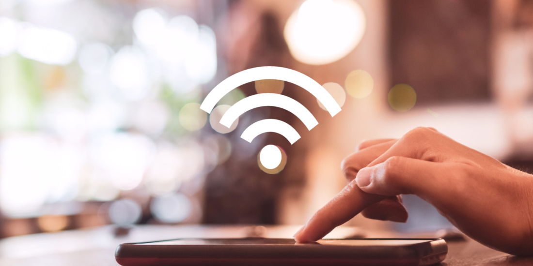 Wifi sign icon and connection screen of smartphone with top view city background. Financial business technology freedom dream life using internet freedom life concept.